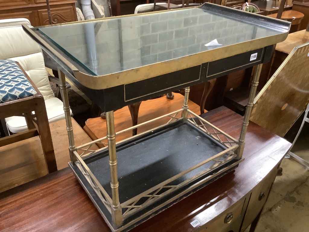 An ebonised brass and lacquer drinks trolley, width 77cm, depth 44cm, height 66cm